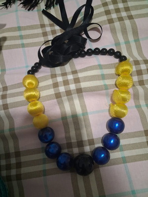Necklace used with blue and yellow elements