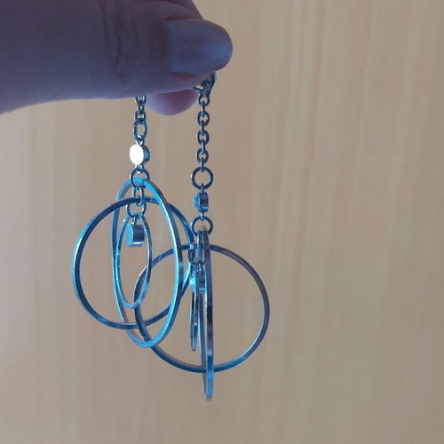 Dangling earrings like new, silver color