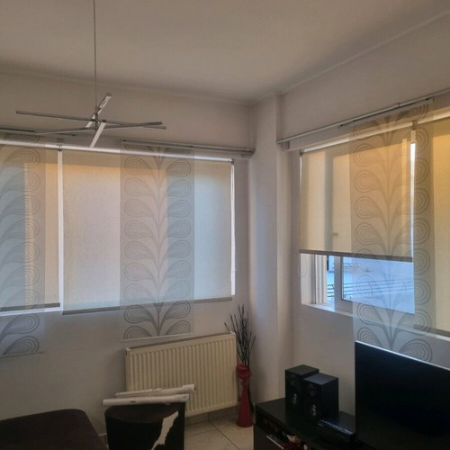 Complete roller curtain rod system like new with double panels