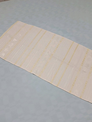 Table runner souvenir from Limnos in white, cream and gold shades