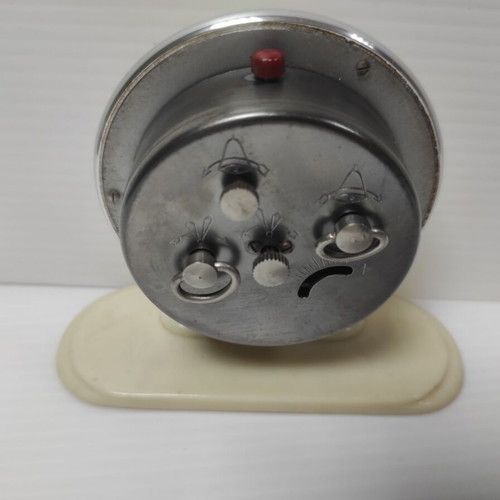 Slava mechanical alarm clock used, analog table clock