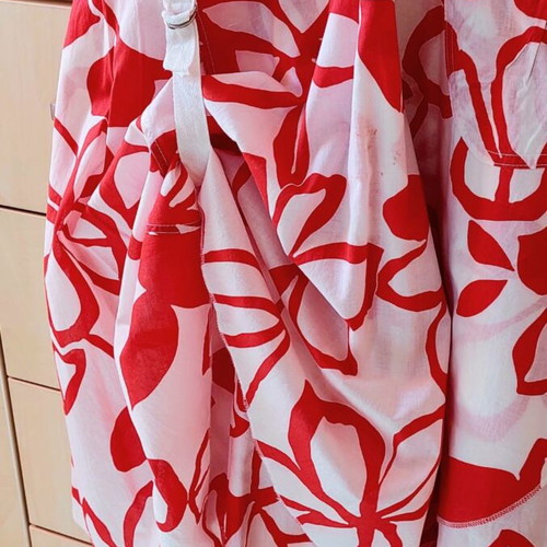 Summer dress with floral pattern and side tie