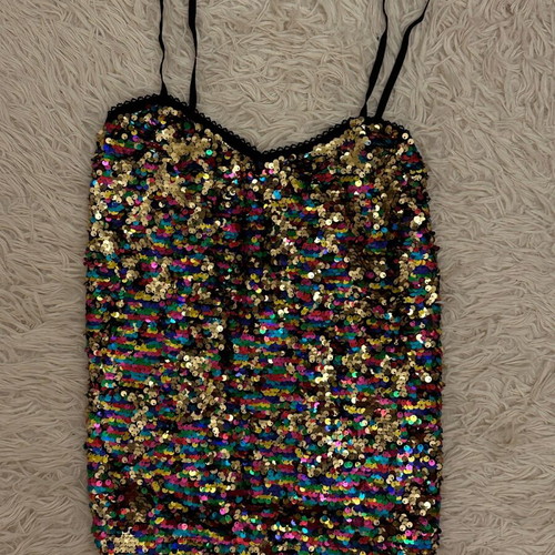 Elastic festive blouse with colorful sequins like new