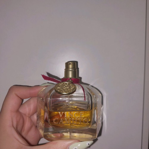 Vince Camuto perfume used, 50% full