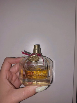 Vince Camuto perfume used, 50% full