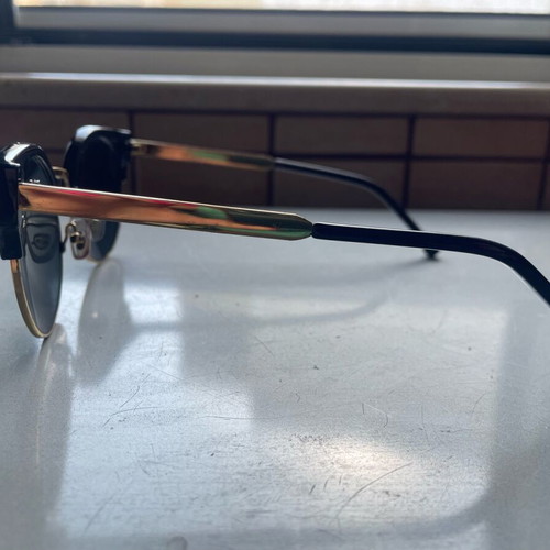 Sunglasses cat eye style like new, black and gold