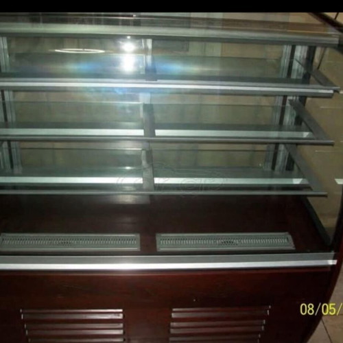 Pastry display case like new with free checkout counter