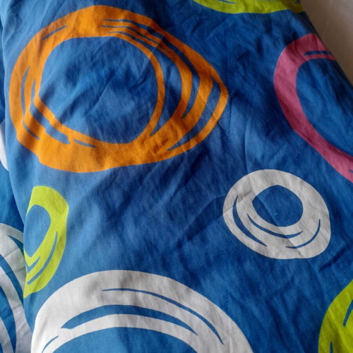 Single quilt used with slight wear