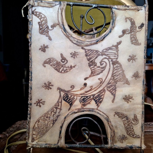 Table lamp used, leather with embossed decoration