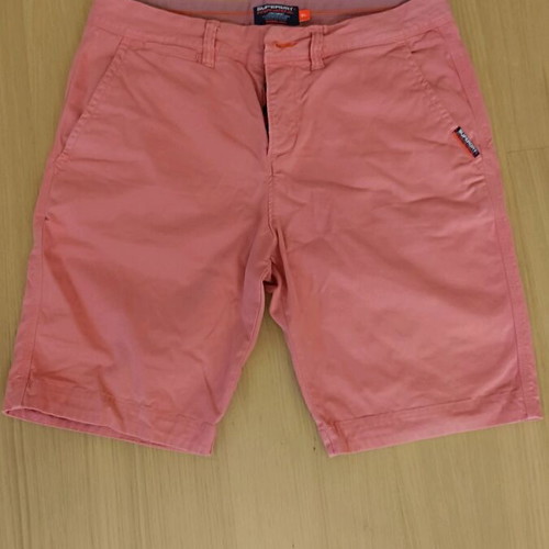 SuperDry men's pink bermuda shorts used, above the knee with buttons