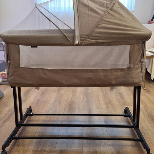 Chipolino double-level baby cot with mosquito net and wheels