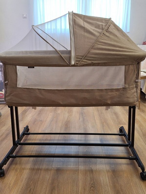 Chipolino double-level baby cot with mosquito net and wheels