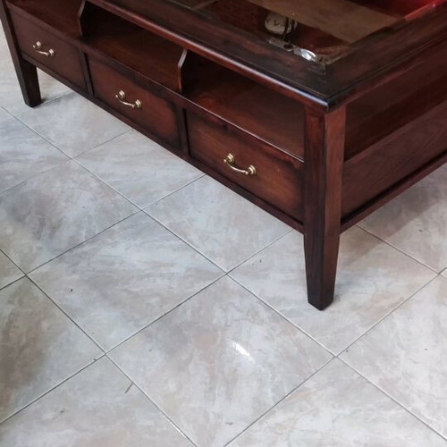 Solid wood coffee table like new with 3 drawers and glass top