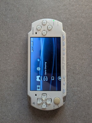Sony PSP 2000 with SD card and 3 games