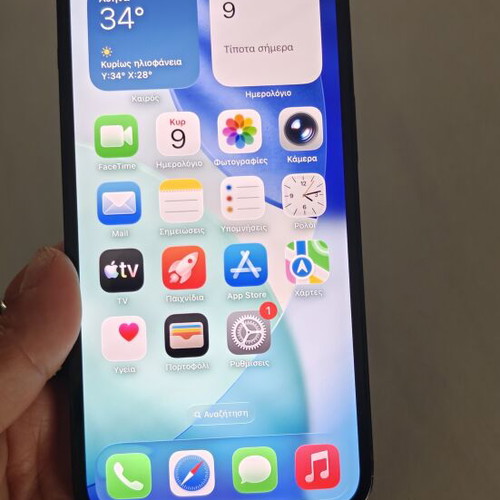 iPhone 13 128GB used with charger, earphones, cases, and power bank