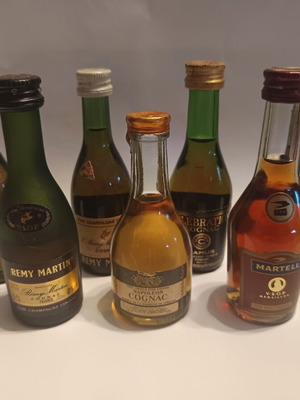 7 miniature cognac bottles, sealed, pack