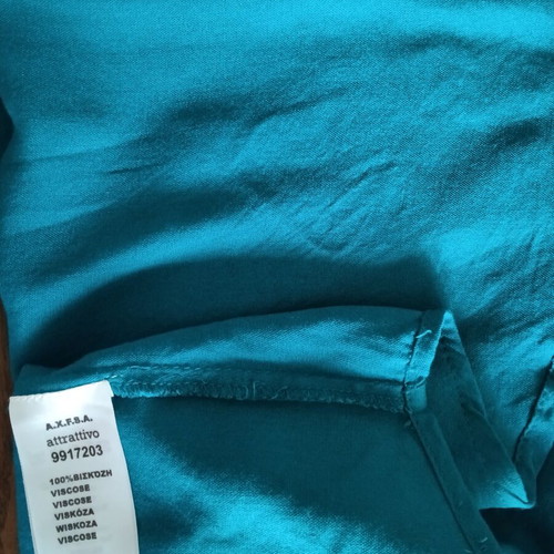 Attrattivo sleeveless blouse turquoise size S like new