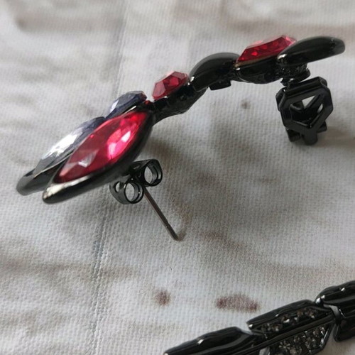 Earrings new, impressive with red and purple stones