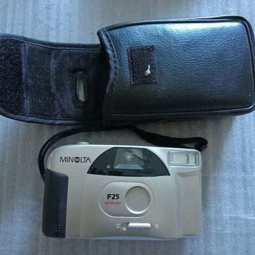 Minolta F25 autoflash camera used with case
