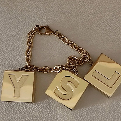YSL bracelet from makeup collection like new, gold color