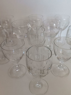 Set of 11 liqueur glasses like new with various designs