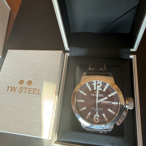 TW Steel watch used with brown strap and date display