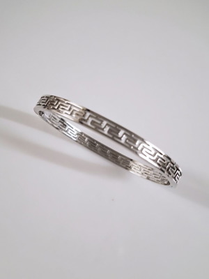 Steel handcuff bracelet in silver tone