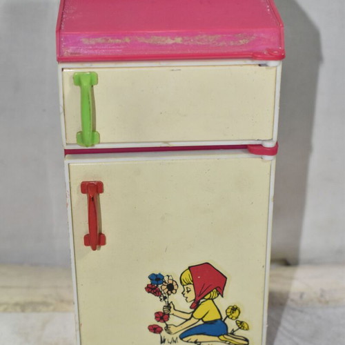 Retro children's kitchen fridge used, plastic and metal with illustration