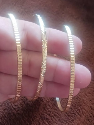 Set of 3 gold-tone bracelets, different designs