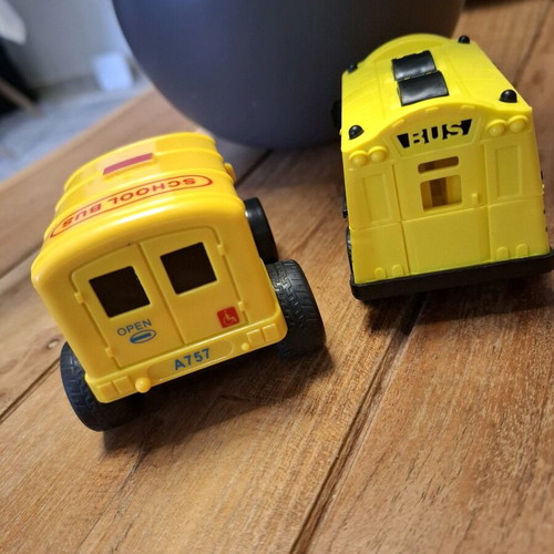 Plastic school bus toy cars like new, set of 2