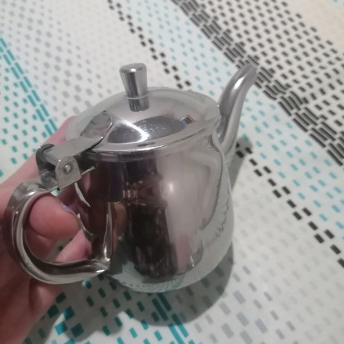 Inox set with 2 egg holders and teapot used