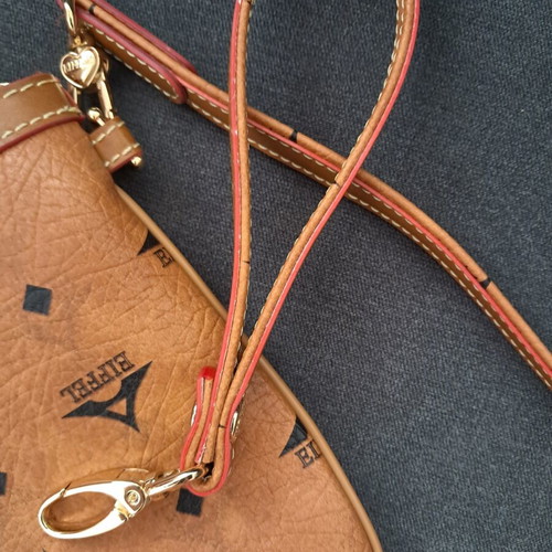La Tour Eiffel crossbody bag like new, brown with gold details