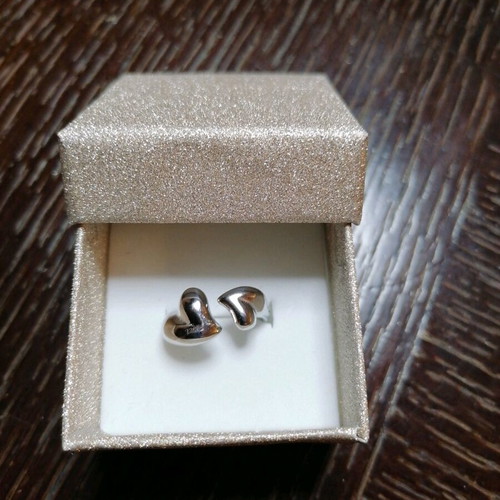 Steel ring with hearts new, silver color