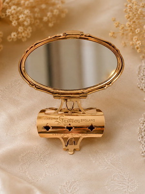 Stratton vintage compact mirror used with enamel bird design
