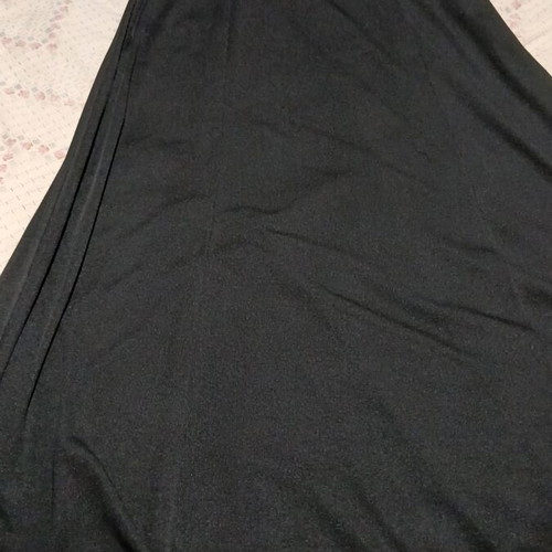 Black maxi dress with open back and decorative ring