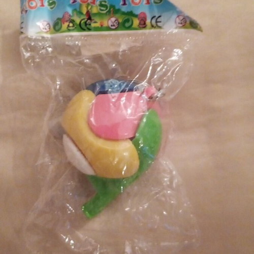 Collectible whistle ball keychain from the 80s, new