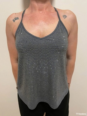 Women's grey sleeveless top with rhinestones