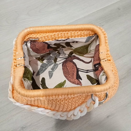 Knitted clutch bag new in salmon color with acrylic chain