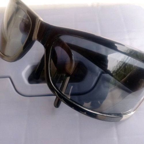 Vogue sunglasses used, black with scratch on lens