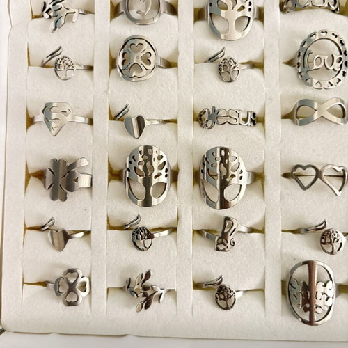 Box of 36 new steel rings with adjustable and fixed sizes