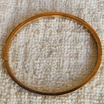 Gold plated stainless steel bangle in rose gold like new, hinged
