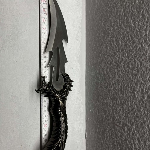 Decorative knife set with ornate handles