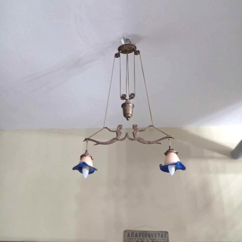 Solid brass two-light ceiling lamp with counterweight and handmade glass