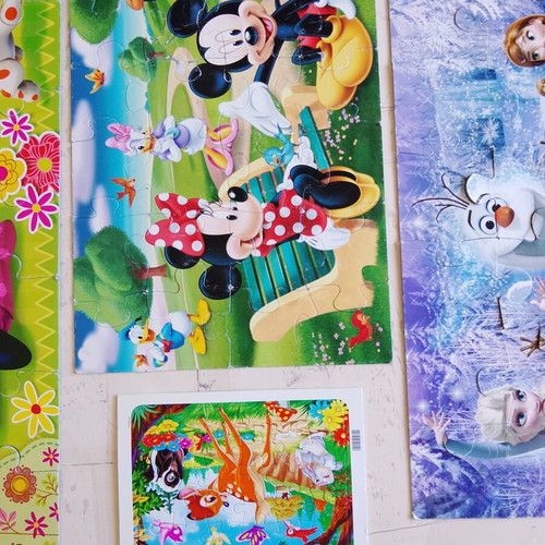 Disney puzzles pack of 4 used with Minnie, Mickey Mouse, Frozen