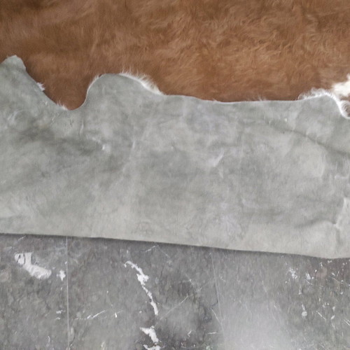 Cowhide rug like new, brown with white