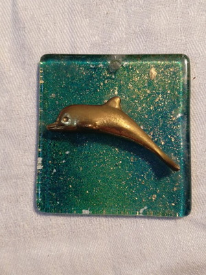 Decorative wall dolphin bronze on glass like new
