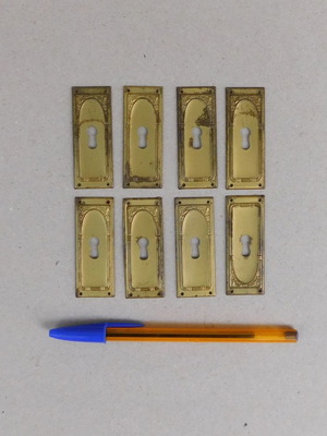 Decorative brass covers for furniture locks