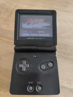 Nintendo Gameboy Advance SP used with Yu-Gi-Oh game and charger