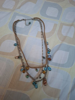 Necklace like new, decorated with small colorful beads