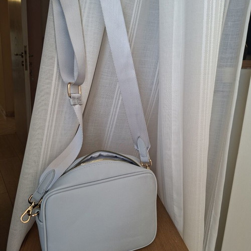 Carpisa bag like new, soft blue with gold details